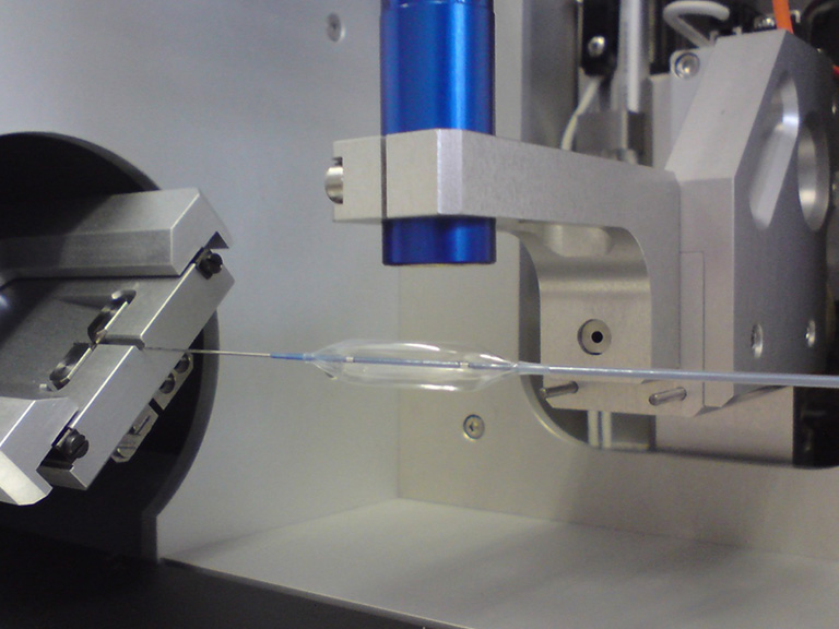 Messung von der Wandstärkendicke eines Balloons